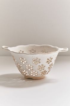 a white bowl sitting on top of a table