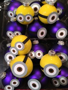 some purple and yellow ornaments with eyes on them