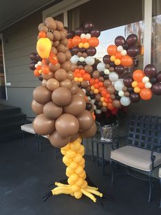 a bunch of balloons that are in the shape of a bird