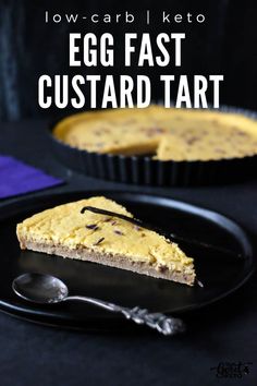 an egg fast custard tart on a black plate