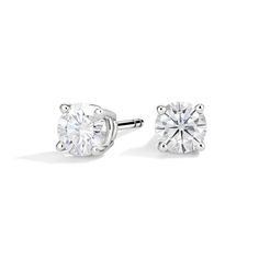 Moissanite Stud Earrings - 14K White Gold. Perfect for everyday wear, these earrings feature two matched and shimmering moissanites prong-set in lustrous, precious metal. Accessories Jewelry Earrings, Quality Jewelry, Eternity Ring, Precious Metals, Prong Setting, Jewelry Accessories, Ring Size, White Gold, Jewelry Earrings