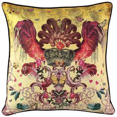 a decorative pillow with an image of roosters and flowers on the front in gold