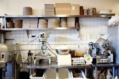 the kitchen is clean and ready to be used for making cakes or pies, as well as other items