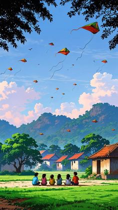 some people are flying kites in the sky over a green field with mountains and trees