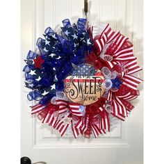 a patriotic wreath with the words sweet home on it