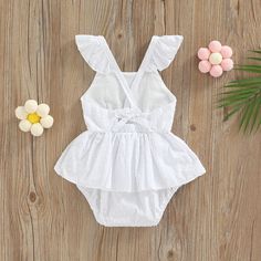 Your little girl will be the cutest girl on the playground! This cute ruffle sleeve romper is perfect for spring and summer. Style it with sandals and a matching hat for a day out. Material: Cotton, Polyester Suggested Age Romper Length Inch Cm 0-6M 11.8 90 6-12M 12.6 32 12-28M 13.4 34 18-24M 14.2 36 *Please allow 1-3cm differences due to manual measurement.