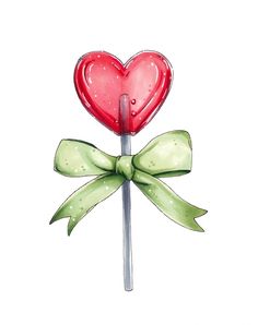 a lollipop with a heart on it and a green bow around the top