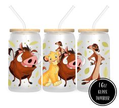 three glass tumblers with cartoon characters on them