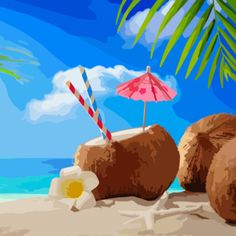 two coconuts and an umbrella on the beach