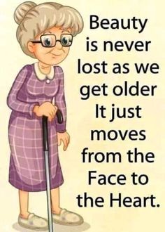 an old woman with glasses is holding a cane and looking at the camera while standing in front of a sign that says beauty is never lost as we get older it just moves from the face to