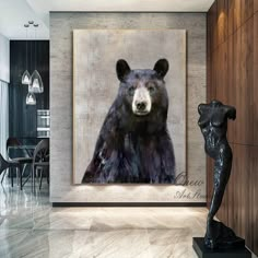 a painting of a black bear is on display in a room with marble flooring