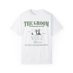 a white t - shirt with an image of the groom on it