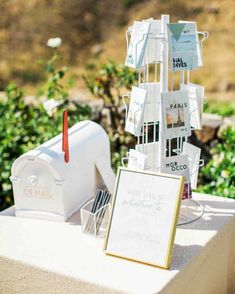 a mailbox and some signs on a table