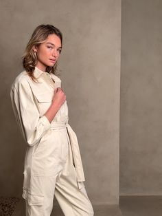 Brave the crisp air of winter's chill in this beautiful utility jumpsuit that takes flight in sumptuous, suede-like moleskin —made with cotton and a kiss of stretch— adorned with a cinched waist and full blouson sleeves to add to the effect of so Olive Green Jumpsuit, Black Sleeveless Jumpsuit, Utility Romper, Tank Jumpsuit, Utility Jumpsuit, Flight Suit, Wrap Romper, Crisp Air, Knitted Romper