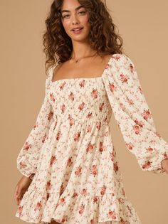 Featuring a smocked bodice for a flattering fit and long sleeves for a touch of warmth, this dress is perfect for every day. The floral print adds a touch of bohemian charm making it a must-have. Cute Long Sleeve Dresses, Football Dress, Thanksgiving Dress, Cute Floral Dresses, Rush Dresses, Puff Sleeve Dresses, Charm Making, Floral Dresses, Altar'd State