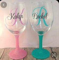 two personalized wine glasses sitting side by side