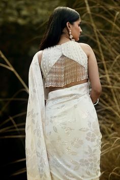 White pre-draped saree with sequin embellished floral patterns. Comes with padded bead and sequin embellished blouse. - Aza Fashions Silk Dupatta Top For Wedding, Elegant Blouse With Dupatta For Celebrations, Silk Top With Dupatta For Wedding, Silk Wedding Top With Dupatta, Elegant Embellished Draped Blouse, Celebration Blouse With Sheer Dupatta In Traditional Drape, Wedding Blouse With Sheer Dupatta And Traditional Drape, Blouse With Sheer Dupatta For Celebrations, Elegant Draped Cutdana Blouse Piece