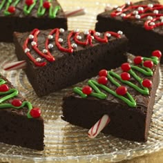 several pieces of chocolate cake decorated with candy canes