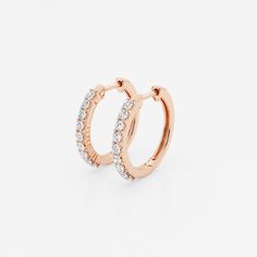 Who doesn't like a pair of classic hoop earrings? This extremely versatile pair can be worn with jeans and a tee, a cocktail dress or at your summer soiree. The high quality lab-grown diamonds shimmer as you move. Classic Rose Gold Huggie Earrings For Anniversary, Everyday Rose Gold Hoop Earrings With Prong Setting, Classic Rose Gold Hoop Earrings For Anniversary, Classic Rose Gold Huggie Diamond Earrings, Classic Rose Gold Huggie Earrings With Brilliant Cut, Pearl And Diamond Earrings, Summer Soiree, Pearl Diamond, High Jewelry