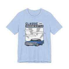 Rev up your style with our retro classic car t-shirt! This cool graphic t-shirt for men features a vintage car design and the words "Classic Vibes, Cruising in Style." Perfect for vintage car enthusiasts and anyone who loves the open road, this awesome men's t-shirt is made from premium quality fabric for maximum comfort. It's a must-have addition to your collection. Whether you're hitting the highway or just chilling with friends, this shirt will have you looking cool and feeling nostalgic. Thi Blue Retro T-shirt With Front Print, Car Graphic Tee Design, Graphic Tees Vintage Cars, Vintage Car T Shirt, Classic Car Tshirt Design, Car T Shirt, Feeling Nostalgic, Retro Car, Open Road