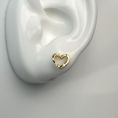 Introducing the Sparkly Heart Stud Earrings - a charming and dainty accessory crafted from 925 sterling silver, with an 18k gold-plated option available. These heart-shaped earrings, measuring 0.8cm x 0.9cm, are adorned with six sparkling cubic zirconia stones, adding a touch of elegance and shine to any look. Perfect for everyday wear or special occasions, the Sparkly Heart Stud Earrings are a beautiful expression of love and a delightful addition to any jewelry collection. Gold-plated Silver Heart Earrings Tarnish Resistant, Silver Gold-plated Tarnish-resistant Heart Earrings, Tarnish Resistant Silver Gold-plated Heart Earrings, Silver Tarnish-resistant Gold-plated Heart Earrings, Gold Heart Cut Earrings Gift For Her, Gold Heart Cut Earrings As A Gift For Her, White Gold Huggie Heart Earrings Gift, Gold Heart Cut Earrings For Her, Silver Gold-plated Heart Earrings