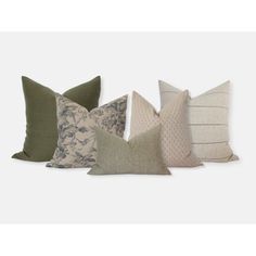 six pillows in various colors and sizes