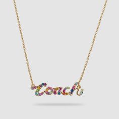 Coach Multicolor Rainbow Signature Script Gold Tone Necklace. New/Original Package. Msrp $118.00. Plated Brass, Glass Rhinestones, Lobster Clasp Closure. Measures 16”L, Extender 2”L. Open Circle Necklace, Poppy Necklace, Script Necklace, Pear Earrings, Pave Necklace, Rose Stud Earrings, Malachite Necklace, Coach Jewelry, Locket Pendant Necklace