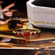 Holiday Notice: We will be on holiday from Feb 6 to Feb 15 for the Spring Festival. Orders will be shipped after we resume work.  Red Garnet Ring, Five Stone Ring, Garnet Stackable Ring, Round Garnet Ring, Garnet Ring Gold, Gemstone Stack Ring, Simple Rings, GiftsFeatures• Made to Order. • Material: 925 Silver with Gold Plated• Custom Gold Color: Yellow Gold• Ready to Ship in 7-15 Business Days Want to find out more? Check out my shop https://www.etsy.com/shop/ZoeJewelryStudioThank you for takin Round Garnet Ring, Garnet Ring Gold, Resume Work, Simple Rings, Red Garnet Ring, Stack Ring, Ring Simple, Garnet Ring, Spring Festival