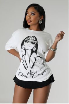 Stretch top T-shirt Round neckline Short sleeve Graphic design 95% Cotton 5% Spandex Hand wash cold Model is wearing a small MODEL STATS Height: 5.3"Bust:33" / Waist:28" / Hips:42"