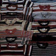 a pile of shirts sitting next to each other