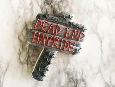 a sign that says dead end hayridge on it with the word'dead end hayridge'spelled in red