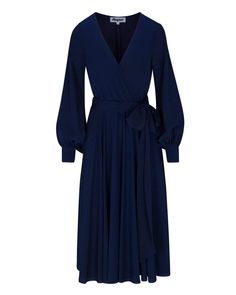 This 70's inspired midi dress features a sexy cross front V-shaped surplice neckline. The elasticized waist adjusts to fit a range of sizes and has an attached self-tying belt at the right-hand side seam. The cuffed bell sleeves add a hint of retro glamour. The opaque fabric has a butter-soft hand with a beautiful navy blue hue. The full, sweeping circle mid-length skirt is perfect for making a dramatic entrance to any event. The skirt is partially lined. DetailsBrand: Meghan LAColor: NavyLength Spring V-neck Dresses With Belted Cuffs, Chic V-neck Dress With Belted Cuffs, Solid Color Belted V-neck Midi Dress, Belted Midi Dress With V-neck, Fall V-neck Belted Maxi Dress, V-neck Midi Dress With Tie Waist For Party, Chic Fall Maxi Dress With Belted Cuffs, Chic Fall Maxi Wrap Dress, Chic Mid-length Maxi Dress With Tie Waist