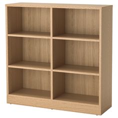 a wooden bookcase with four shelves on each side