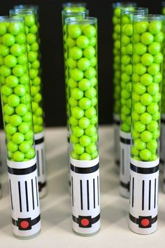 there are some green candies in plastic tubes