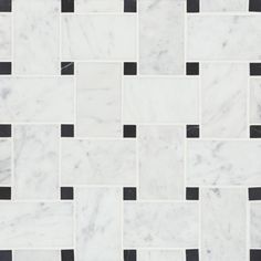 a white and black tile with squares on it