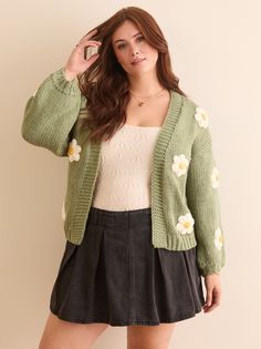 This cozy knit piece features intricate 3D floral details throughout, adding a touch of fun. The soft, comfortable fabric and relaxed fit make it perfect for layering or wearing on its own. Flower Cardigan, Knitted Flowers, Cozy Knit, Cozy Knits, Christmas Dress, Christmas Sweatshirts, Dress With Boots, Sweater Outfits, Make It