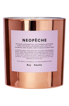 a candle with a label on it that says neopeche in english and french