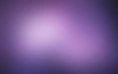 an abstract blurry background in purple