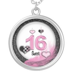 a pink and black necklace with the number sixteen on it's front, surrounded by hearts