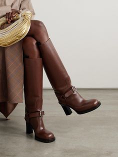 Burberry's 'Le Stirrup' knee boots are inspired by the label's equestrian heritage. Crafted from leather, they have buckled straps, chunky round toes and the house's archival logo embossed on the soles. Burberry Boots, Fall Winter Shoes, Leather Thigh High Boots, Leather Knee Boots, Stirrup Leathers, Equestrian Boots, Tall Leather Boots, Burberry Shoes, Pull On Boots