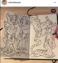 someone is drawing some cartoon characters in their notebook