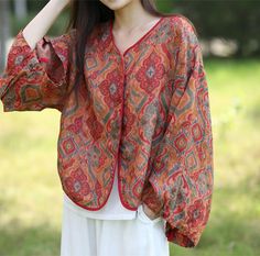 Fabric: RamieColor: RedStyle: Ethnic Style Size Bust Length Shoulder Sleeve cm inch cm inch cm inch cm inch One Size 122 48.03 62 24.41 60 23.62 47 18.50 Red Bohemian Shirt For Spring, Orange Bohemian Relaxed Fit Top, Red Traditional Printed Blouse, Bohemian Red Blouse Relaxed Fit, Bohemian Red Blouse With Relaxed Fit, Red Printed Traditional Blouse, Traditional Red Printed Blouse, Traditional Red Blouse For Fall, Traditional Red Long Sleeve Top