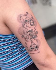 a woman with a tattoo on her arm that has pictures of cats and dogs in it