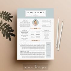 a resume template with a photo on the front and side, sitting next to a plant