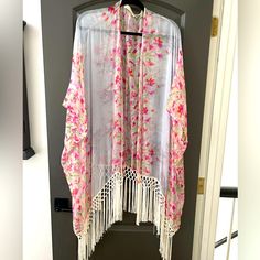 This Beautiful Silk Kimono Is Perfect Boho-Wear For Your Closet. Can Be Worn Over T-Shirt With Jeans, Or Dressed Up For Formal Occasions. Never Worn. Like New. Colors In Shades Of Pink Multi. Spring Kimono With Tassels, Spring Fringed Long Sleeve Kimono, Spring Long Sleeve Fringed Kimono, Spring Fringe Long Sleeve Kimono, White Spring Outerwear With Tassels, White Tasseled Outerwear For Spring, Spring Kimono With Tassels And Long Sleeves, Long Sleeve Kimono With Tassels For Spring, Spring Long Sleeve Kimono With Tassels