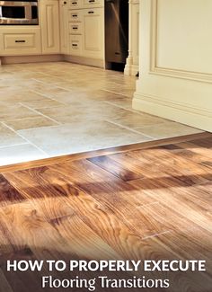 a kitchen with white cabinets and wood flooring that says how to properly execute flooring transitions