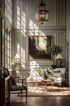 the sun shines through the windows in this living room with white walls and wood flooring