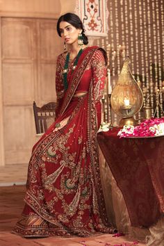 Latest Royal Deep Red Saree Bridal Pakistani Dress Elegant Red Sharara With Pallu, Elegant Red Saree With Dabka Work, Elegant Red Traditional Wear With Sheer Dupatta, Traditional Kundan Dress With Sheer Dupatta, Red Lehenga For Formal Festive Occasions, Formal Red Lehenga With Intricate Embroidery, Red Sharara With Intricate Embroidery For Formal Events, Red Traditional Unstitched Gown, Red Sharara With Intricate Embroidery For Formal Occasions