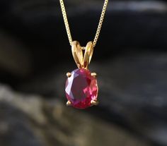 Gold Ruby Pendant set with a Created Ruby in a perfect diamond cut, flawless clarity & deep red color, at 10x8mm, 3 Carats.Red Oval Pendant design made of Gold Vermeil ☞ thickest 18k Gold Plating on top of Solid 925 Sterling Silver ☞ made to last.Free Gold Vermeil Chain with every Pendant order, 18 inch Silver chain (46 cm) ✓Matching Ring: www.etsy.com/listing/995104306Matching Earrings - please ask me ⌛Last Pendant left ⌛  Details : ♥ Each item packaged in a cute GIFT BOX ✓♥ GUARANTEE on th Red Oval Necklace For Anniversary, Oval Red Necklace For Anniversary, Red Oval Jewelry With Prong Setting, Red Oval Diamond Cut Necklace, Ruby Oval Pendant Fine Jewelry Necklace, Fine Ruby Jewelry With Oval Pendant, Ruby Pendant Set, Yellow Gold Ruby Oval Pendant Jewelry, Yellow Gold Ruby Round Pendant Necklace