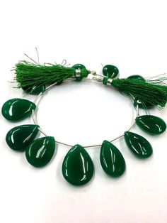 GEMSTONE  - GREEN ONYXSHAPE           - PEARSIZE               - 14-15 MM COLOR         -  GREEN BEAUTIFUL STRAND 100% NATURALWHOLESALE SHOPIf you have any questions about this item please contact me I will get back to you as soon as.We accept bulk or wholesale orders for any gemstone which you'll get best wholesale prices! Hence you can contact me with your requirement of bulk or wholesale order. I’ll be happy to fulfill your order. Green Faceted Beads For Jewelry Making, Green Beaded Round Gemstones, Green Teardrop Faceted Beads Jewelry, Green Round Beaded Gemstones, Green Polished Beads For Jewelry Making, Green Briolette Gemstones For Jewelry Making, Green Faceted Beads Gemstones For Jewelry Making, Handmade Green Round Bead Gemstones, Handmade Green Briolette Gemstones